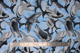 Flat swatch sharks fabric (light blue/white marbled look fabric with large tossed grey and white realistic looking sharks in various positions, open mouths)