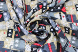 Swirled swatch Packed Cats fabric (packed cartoon cats in grey, blacks, beiges, etc. with red collars and hearts)