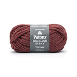 A ball of Patons Highland Bulky yarn in shade Pecan (burnt red orange)