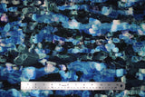 Flat swatch assorted floral printed fabric in blue (dark blue/black fabric with watercolour look horizontal abstract lines pattern in various blue and green shades)