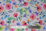 Flat swatch blossom fabric (white fabric with tossed pink, purple, blue, orange floral and green/black stems and greenery)
