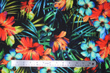 Flat swatch hibiscus fabric (black fabric with large tossed red, blue, orange hibiscus flowers and green/blue leaves)