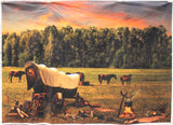 Full panel swatch - Sunset Panel (45" x 33") (open green field with tall green forest trees behind, brown horses in field and little house on the prairie style wagon with white covering, orange/blue sunset sky) 