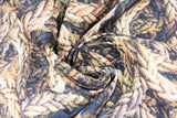 Swirled swatch cream fabric (thick cream coloured rope layered collage)