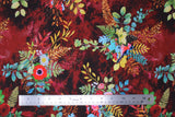 Flat swatch garnet bird fabric (dark red/burgundy marbled look fabric with large floral and greenery clusters tossed in blue, red, white, yellow, green, brown colourway with various leaves and floral, blue and pink birds)