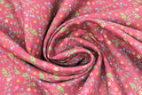 Swirled swatch floral fabric (dark red fabric with small tossed greenery and floral allover in green, yellow, pink, and blue)