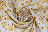 Swirled swatch chicks fabric (white fabric with tossed small cartoon yellow chicks allover and pink and blue polka dots, tossed yellow floral heads)
