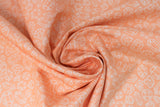 Swirled swatch gemstone fabric (peach coloured fabric with tossed white gemstone shape outlines allover)