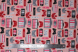 Flat swatch Gaming Console fabric (light pink fabric with assorted cartoon style gaming controllers and consoles in grey, black, pink, white and red shades)