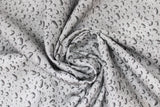 Swirled swatch droplets grey fabric (medium grey marbled look fabric with realistic water droplets in grey allover)