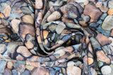 Swirled swatch pebbles natural fabric (layered collage realistic look stones/pebbles in various styles and shapes all with a natural/neutrals colourway)