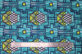 Flat swatch Owls fabric (blue and teal distressed look fabric with navy geometric line design allover with lime green squares and geometric style owls)