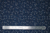 Flat swatch Tossed Hardware Blue fabric (dark blue fabric with tossed grey nuts, bolts, screws, etc.)