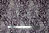 Flat swatch Tire Tracks fabric (grey marbled look fabric with charcoal tire track marks allover)