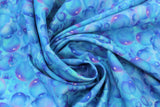 Swirled swatch Bubbles fabric (light blue fabric with tossed/collaged blue bubbles in various sizes allover)