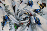 Swirled swatch Ski-Do fabric (white snowy hill printed fabric with tossed clusters of trees and ski-do riders in full gear with blue, yellow, red and green snow mobiles)