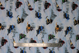 Flat swatch Ski-Do fabric (white snowy hill printed fabric with tossed clusters of trees and ski-do riders in full gear with blue, yellow, red and green snow mobiles)