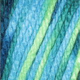 Swatch of Caron Simply Soft Paints yarn in shade peacock feather (medium to deep blues/green colourway)