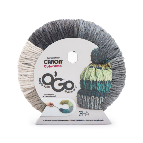 Caron Colorama round shaped yarn with label in colourway Salt and Pep (cream, charcoal, medium grey, grey, greige)