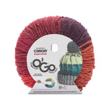 Caron Colorama round shaped yarn with label in colourway Wine Time (deep burnt orange, plum purple, burgundy, fuchsia, bright orange)