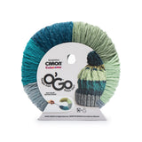 Caron Colorama round shaped yarn with label in colourway Baja (deep teal, pale hunter green, mint, baby blue, teal)