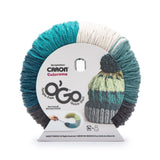 Caron Colorama round shaped yarn with label in colourway Blue Mustang (cream, faded teal, pale navy, medium teal, bright teal)