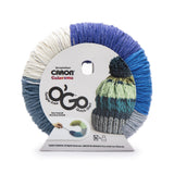Caron Colorama round shaped yarn with label in colourway Overboard (pale blue grey, medium bright blue, dark bright blue, cream, pale deep blue)