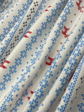Swirled swatch winter themed flannel in Deer lighter blue stripes (small print Christmas sweater look stripes with red deer pattern on white)