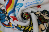 Swirled swatch Wonder Woman licensed print on fleece (text, stars, and superhero on white)