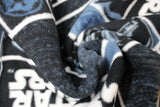 Swirled swatch Star Wars licensed print on fleece (text and darth vaders on black and dark blue)