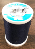 A spool of Coats & Clark Dual Duty All Purpose thread in Navy