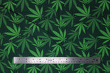Flat swatch pot leaf print fabric on green