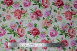 Flat swatch flower printed fabric in white (pink/purple flowers and stems/leaves on white)