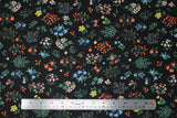 Flat swatch Strawberry Fields collection floral printed fabric in pressed floral (small multi-coloured floral bunches on black)