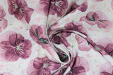 Swirled swatch floral printed fabric in rosewood (white fabric with tossed purple floral heads in medium size and colour wisps)