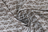 Swirled swatch Leafy Gray fabric (white fabric with medium thick stripes of gray leaves making sideways v shapes)