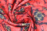 Swirled swatch fabric red layered poppies (red/black/yellow layered poppy heads allover)