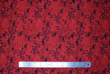 Flat swatch fabric dragonfly & bee red (red fabric with black bees and dragonflies tossed, "15" text and faded notes looking square shapes with faint writing)