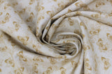 Swirled swatch forest themed fabric in Gold Butterflies (small pale gold butterflies on white)