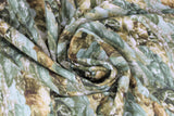 Swirled swatch river bottom green fabric (pale medium green and white water texture fabric with rocks and greenery)