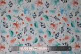 Flat swatch whale themed fabric in Sea Life White (assorted cartoon sea creatures on white)