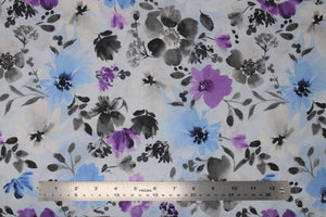 Group swatch fabric bolts in various floral patterns/styles