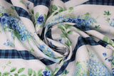 Swirled swatch Stripe fabric (white stripes of vases and blue floral and blue old style bikes, thinner white stripes of leaves/greenery and blue floral heads all separated by blue plaid stripes)