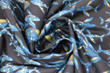 Swirled swatch Midnight Whale fabric (deep navy fabric with tossed blue whales allover with stars and moons within)