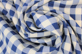 Swirled swatch blue and white medium sized gingham print fabric