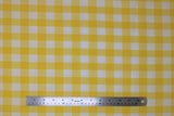 Flat swatch yellow and white medium sized gingham print fabric