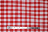 Flat swatch bright red and white medium sized gingham print fabric