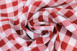 Swirled swatch red and white medium sized gingham print fabric