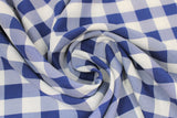 Swirled swatch royal blue and white medium sized gingham print fabric