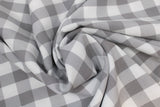 Swirled swatch grey and white medium sized gingham print fabric